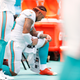Albert Wilson of the Miami Dolphins kneels during the playing of the national anthem prior to the game against the Baltimore Ravens at Hard Rock Stadium on September 8, 2019 in Miami, Florida.
